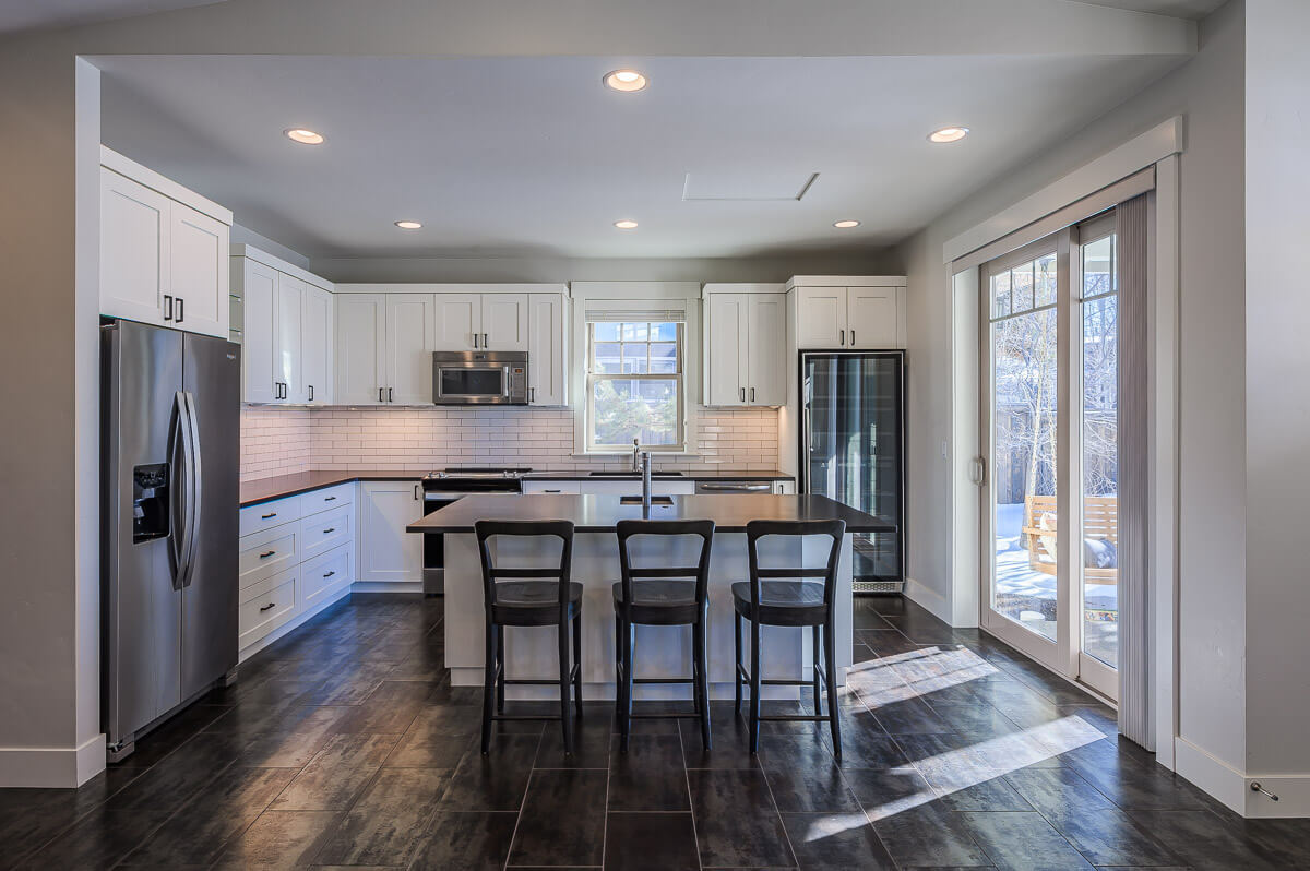 Professionally photographed Bend luxury home interior kitchen highlighting natural light
